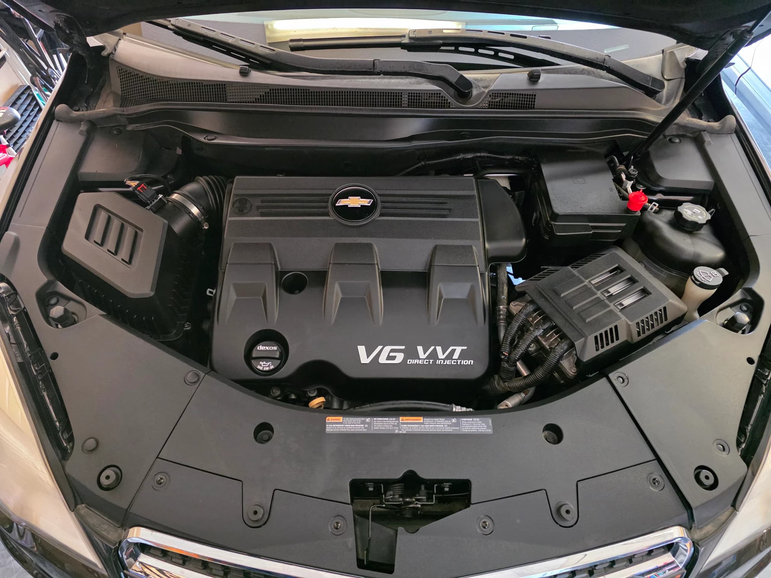 Clean Chevrolet engine bay after detailing